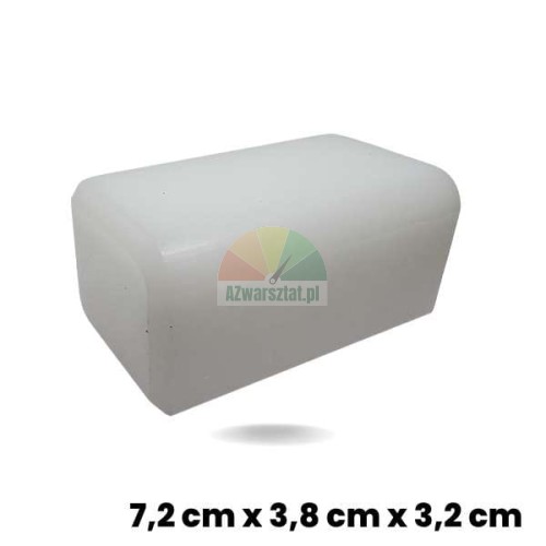 Bílý kluzný blok zvedáku (kostka) o rozměrech 7,2 x 3,8 x 3,2 cm z plastu.