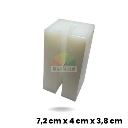 Bílý kluzný blok pro zvedák o rozměrech 7,2 x 4 x 3,8 cm vyrobený z odolného plastu.