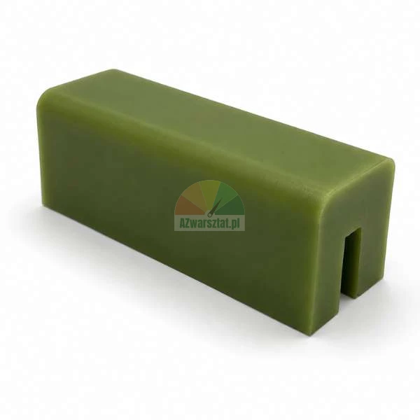 Zelený kluzný blok pro zvedák o rozměrech 7,4cm x 2,8cm x 2,8cm z plastu na bílém pozadí.